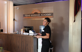 Female student Learning Professional massage and spa services at massage school